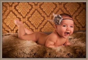 Baby on a Bear Skin Image at Ollar Photography Portrait Studio